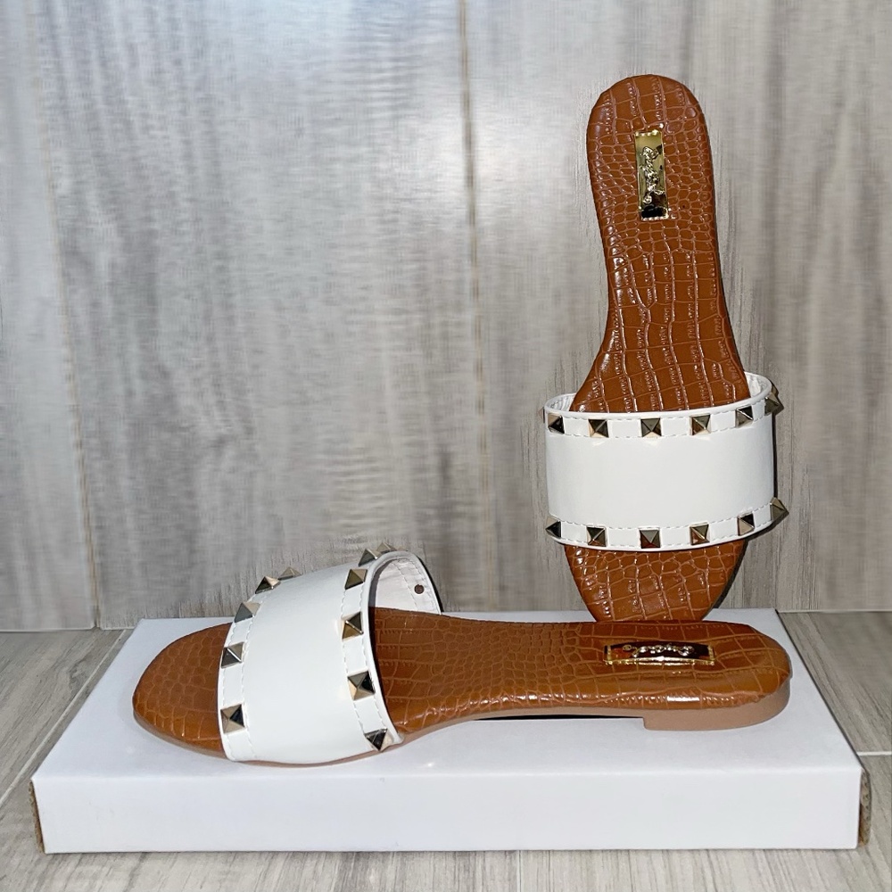 White sandals with golden studded